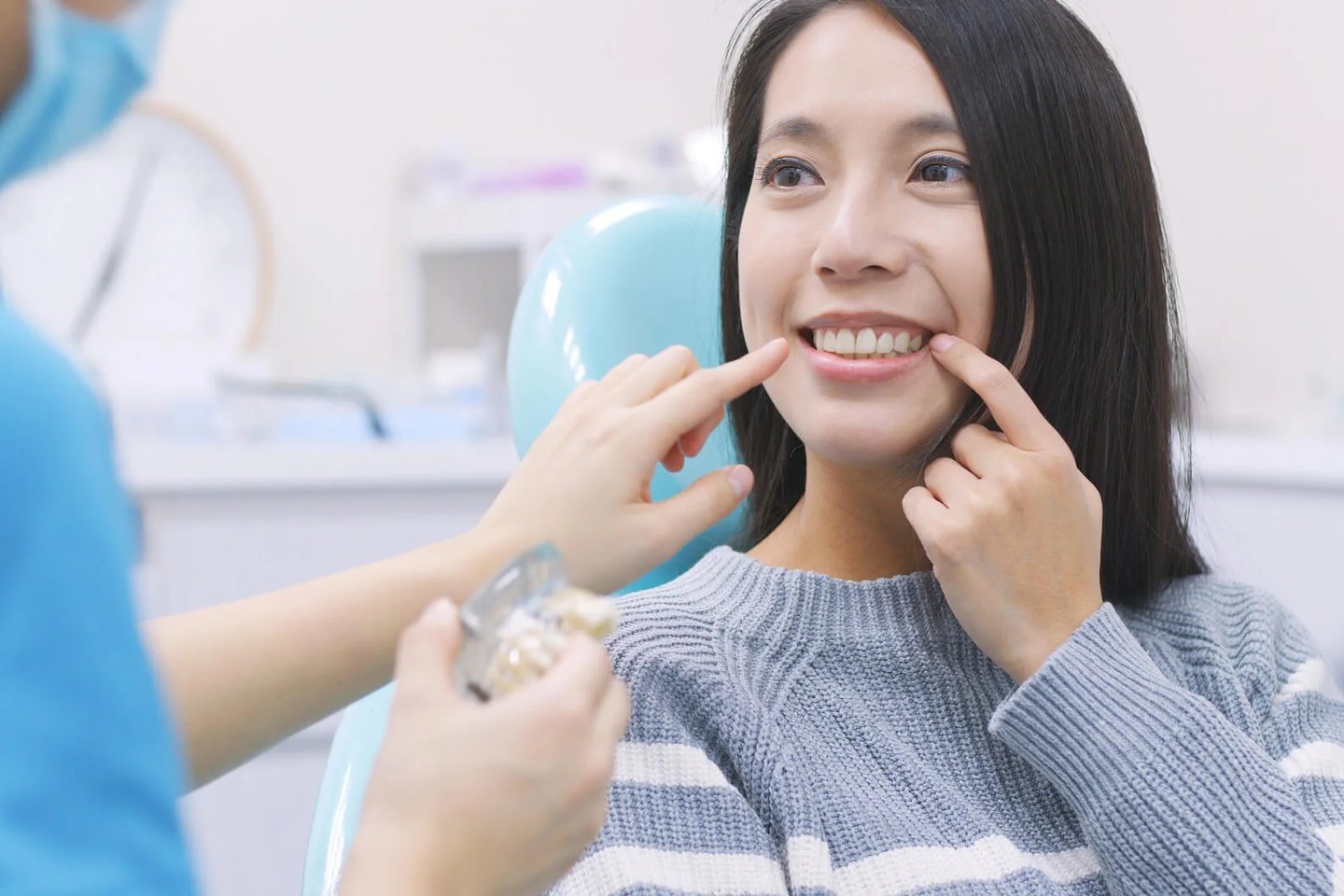Patient smiling after implant consultation dental implants in Winter Park, FL