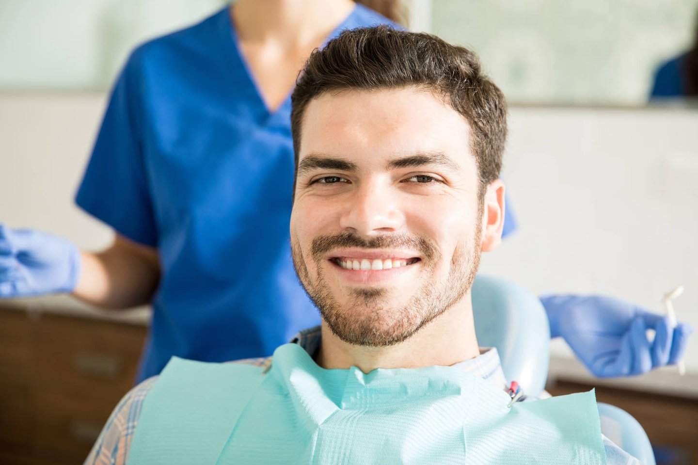 man happy after Full Mouth Restoration procedure