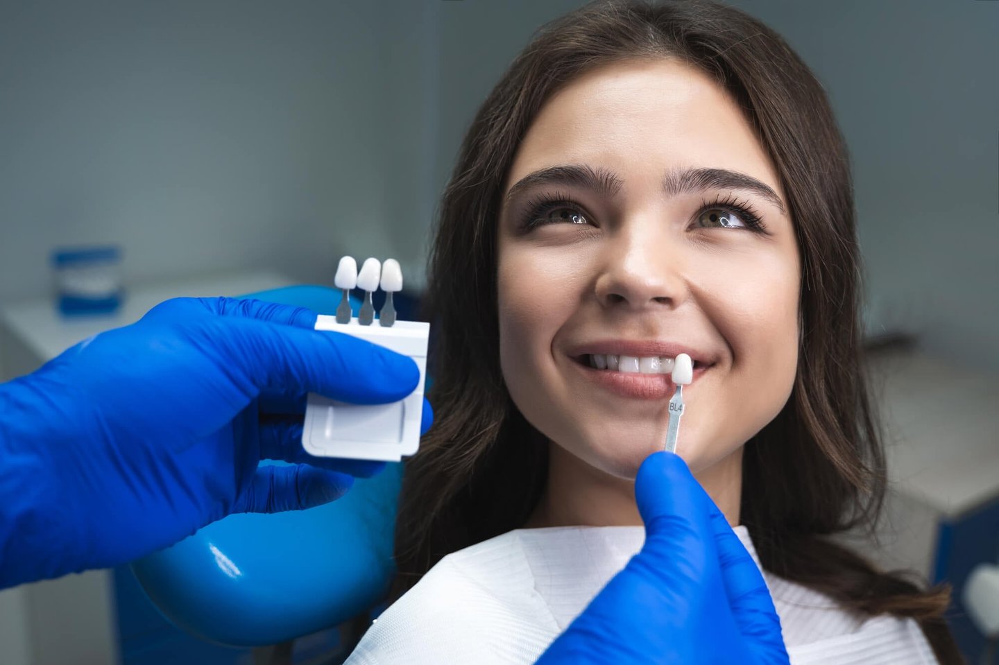 a woman getting porcelain veneers in orlando fl 