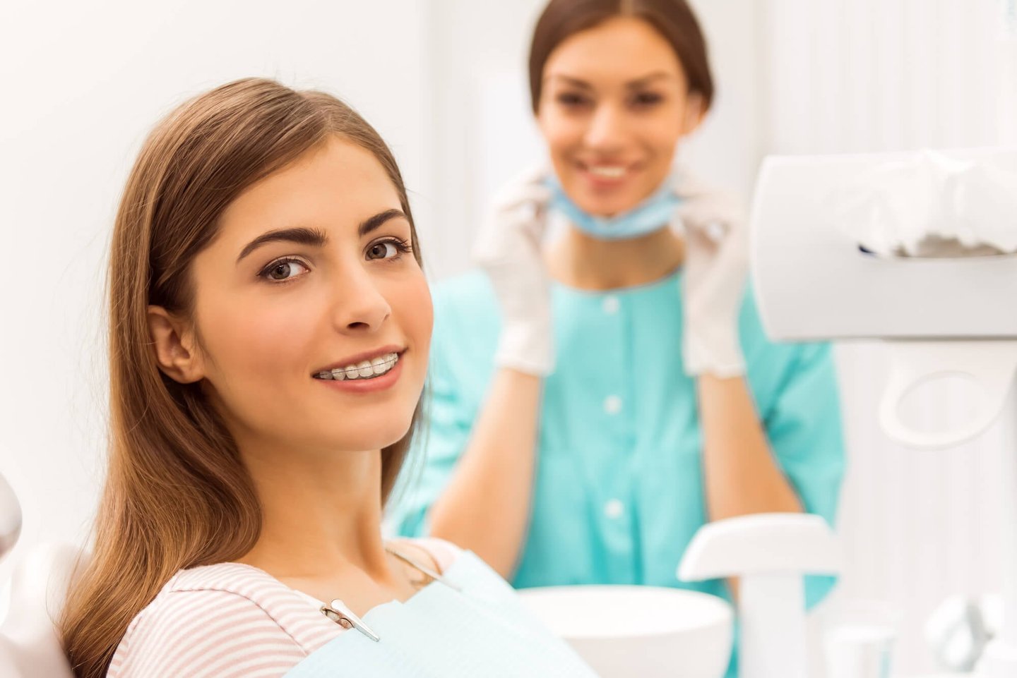 teen during appointment with a cosmetic dentist in winter park