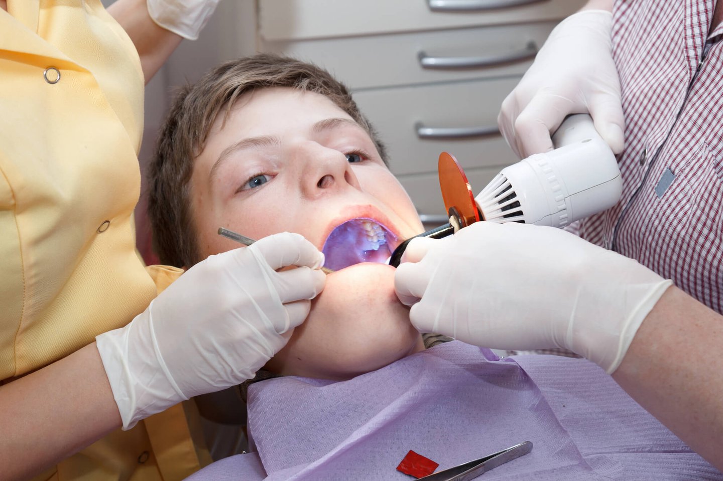cosmetic dentist in winter park with a young patient