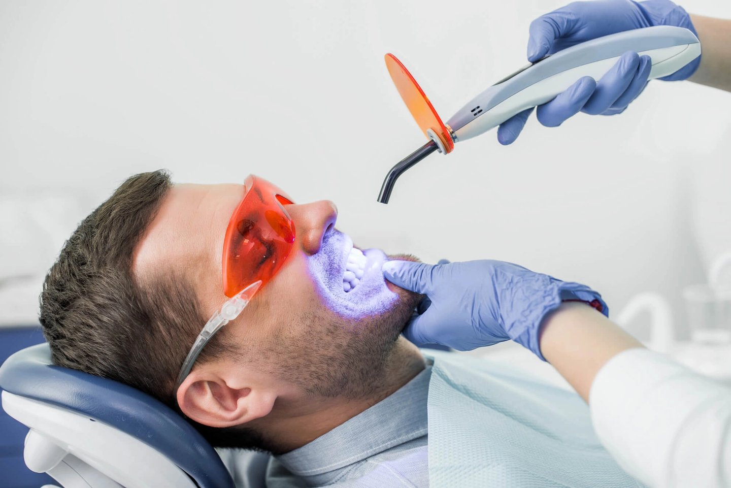 Man-undergoing-teeth-whitening-winter-park
