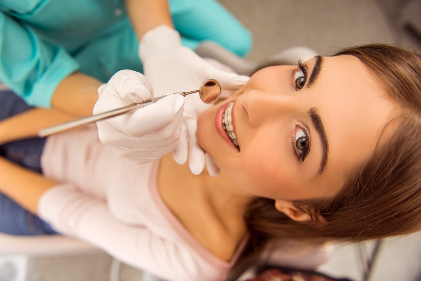 a young woman getting dental crowns in orlando fl 