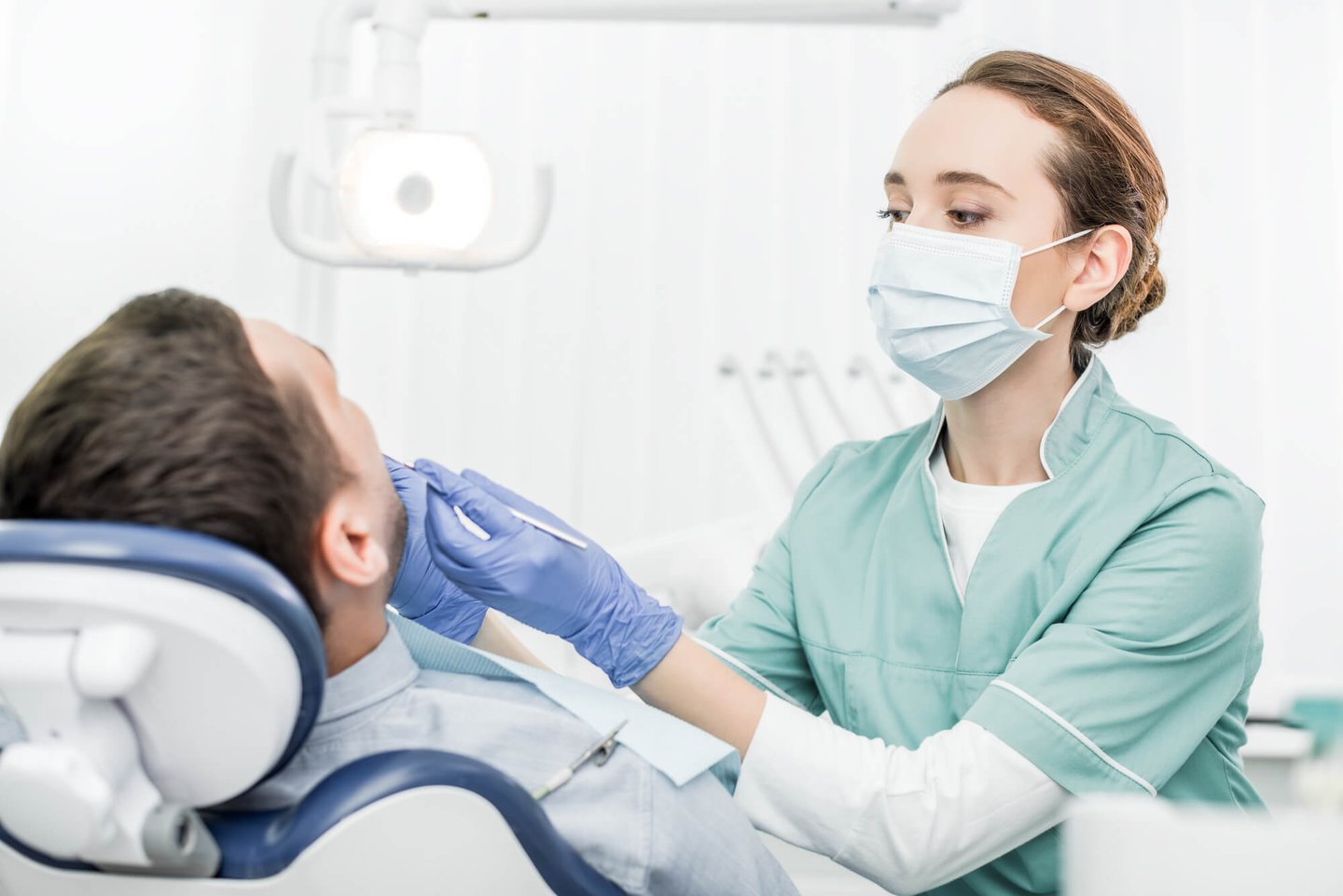 dentist performs full mouth restoration
