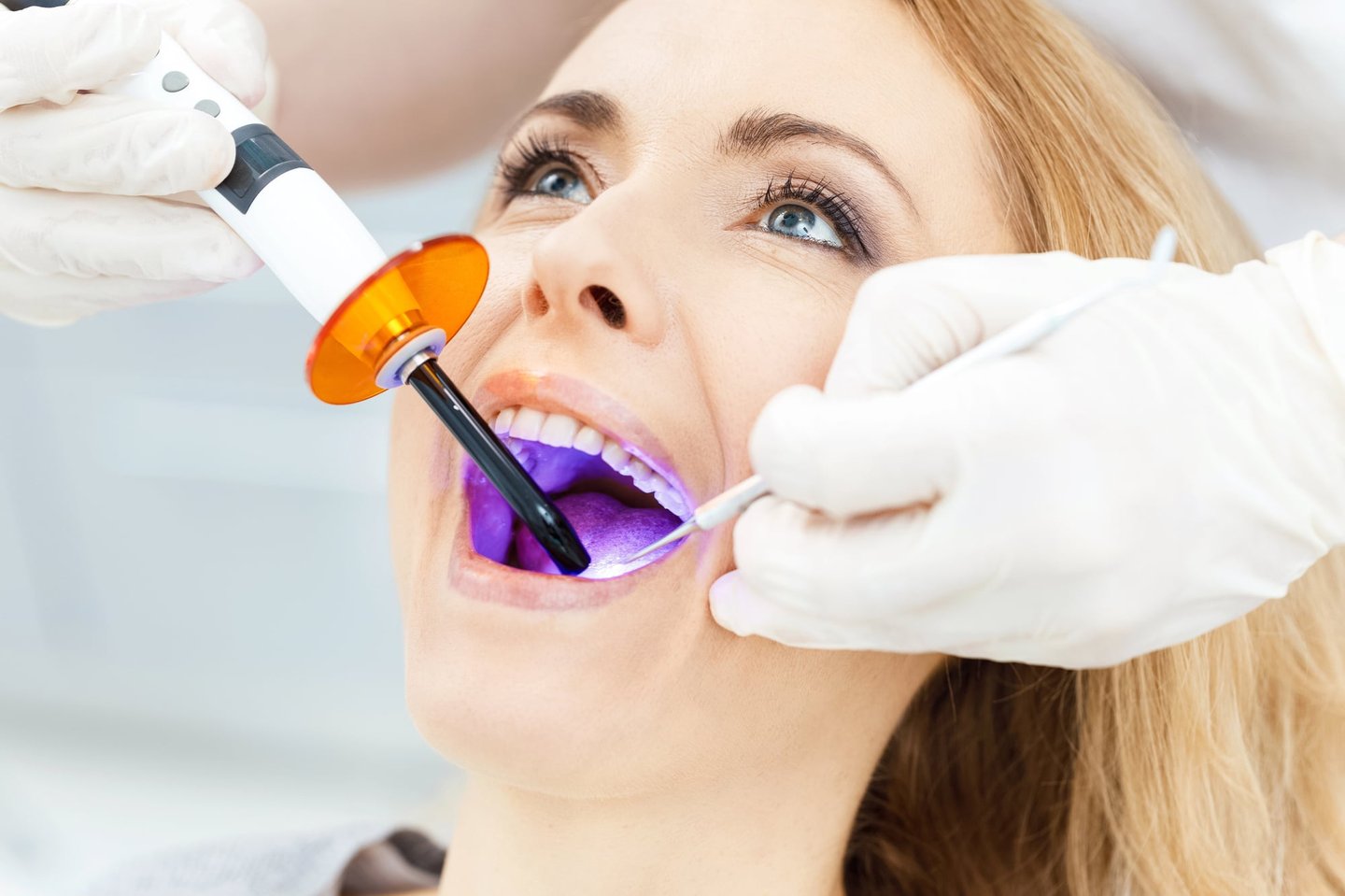 woman getting teeth whitening in winter park
