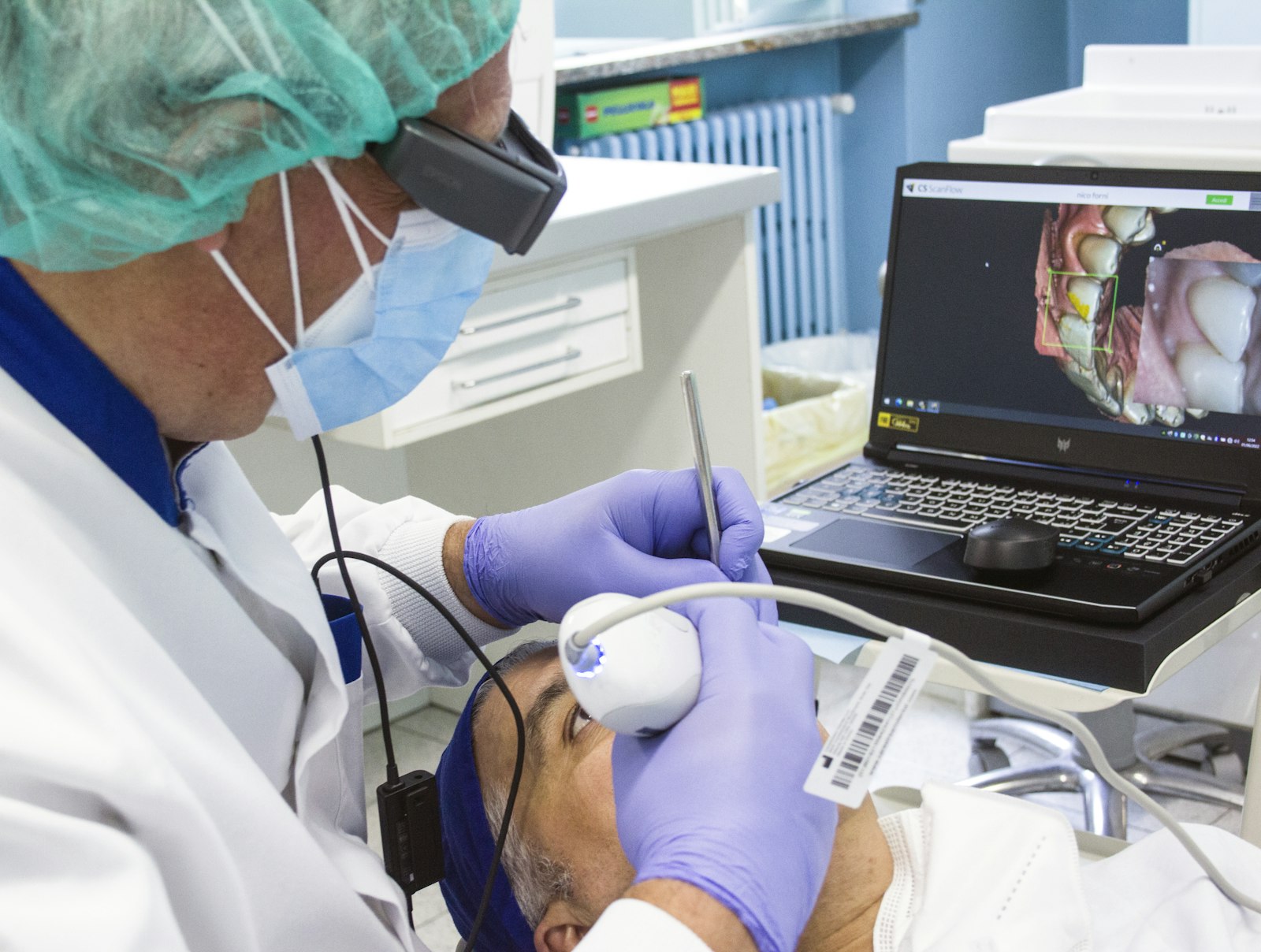 Dentist using digital guidance for implant planning