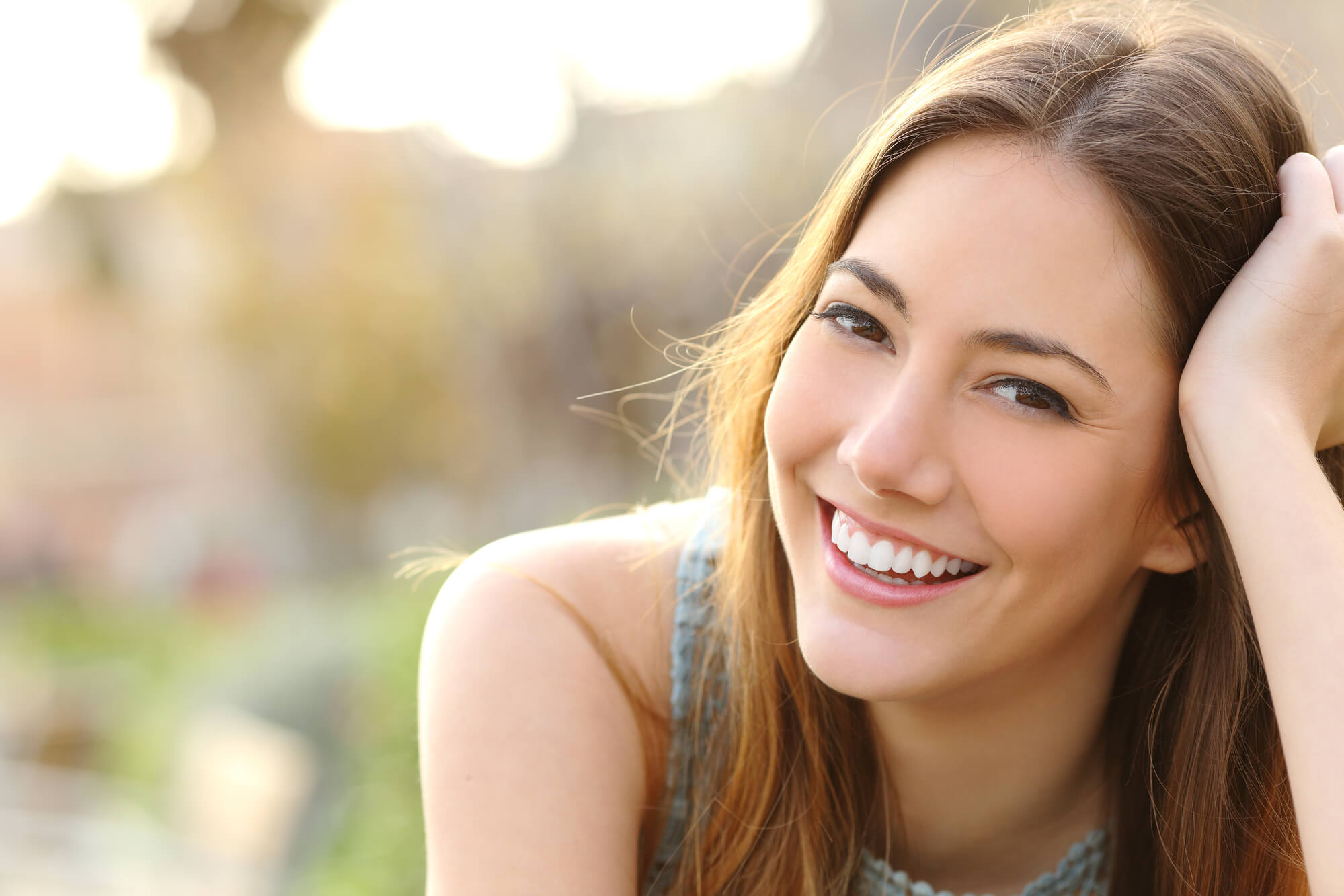 confident smile after seeing a cosmetic dentist winter park