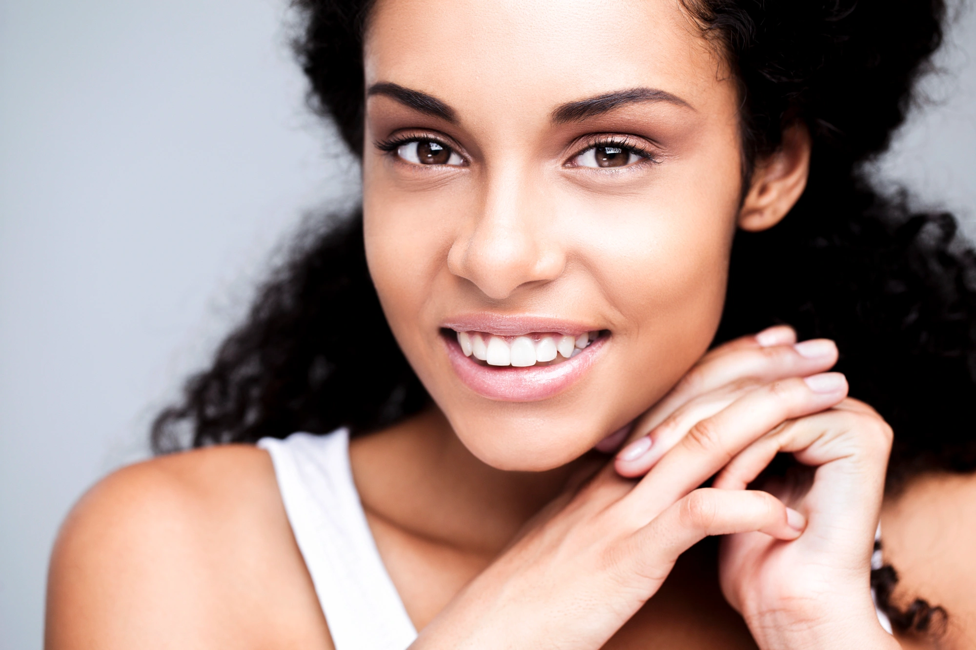 woman-happy-with-her-new-Veneers-in-Orlando