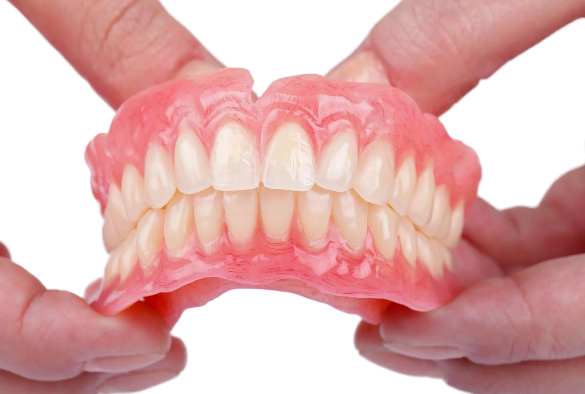 Full denture model showing complete smile dental implants in Orlando, FL