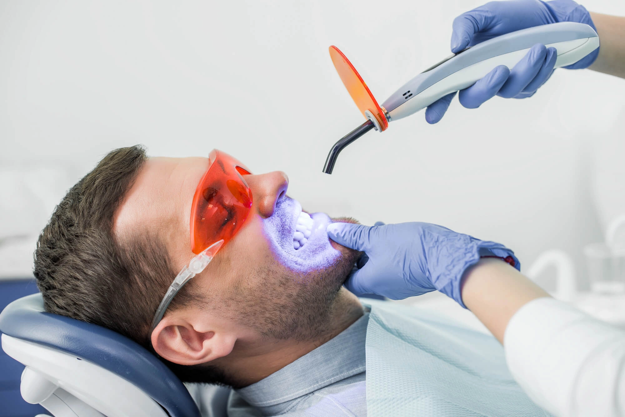 Man-undergoing-teeth-whitening-winter-park
