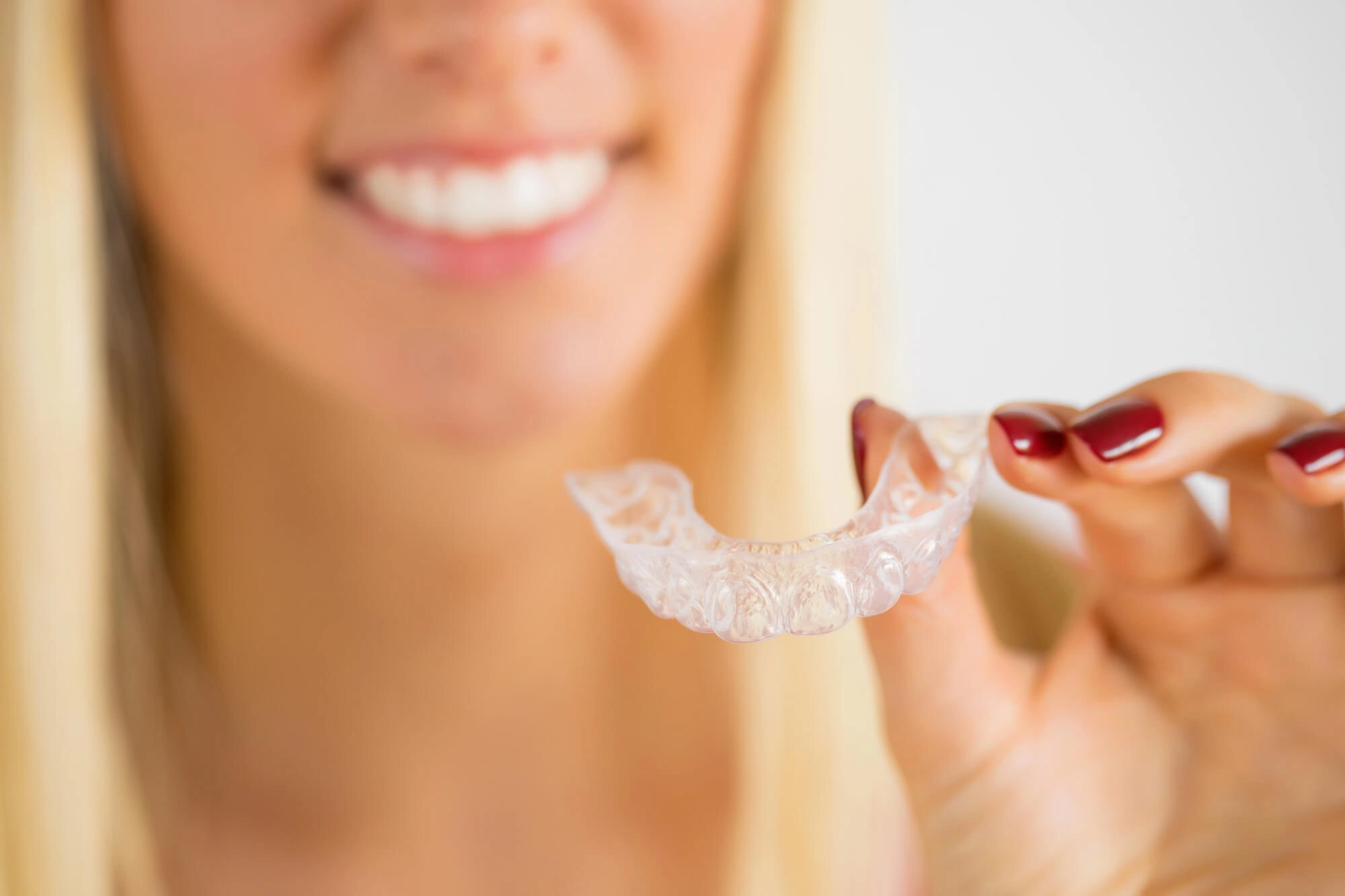 Woman showing winter park fl invisalign